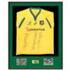Framed Australian Wallabies rugby jersey with player autographs and action photos.